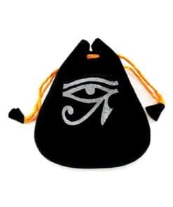 A black bag with a silver Egyptian eye symbol on it