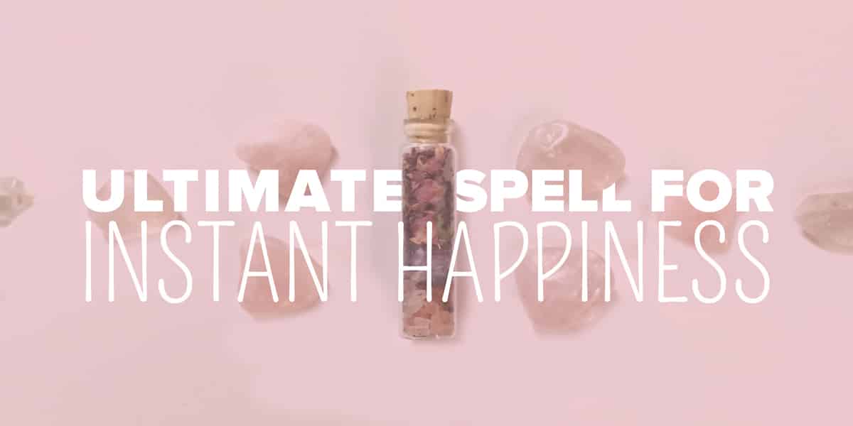 Happiness Spell Jar Tutorial: A Beginner Witchโs Guide to Joy & Positivity 2 a bottle with a cork and a cork and crystals, the end result of a happiness spell jar tutorial