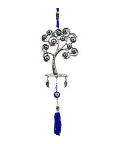 A pewter tree with lots of blue eye beads on the branches. The bottom has a blue tassel hanging from it.