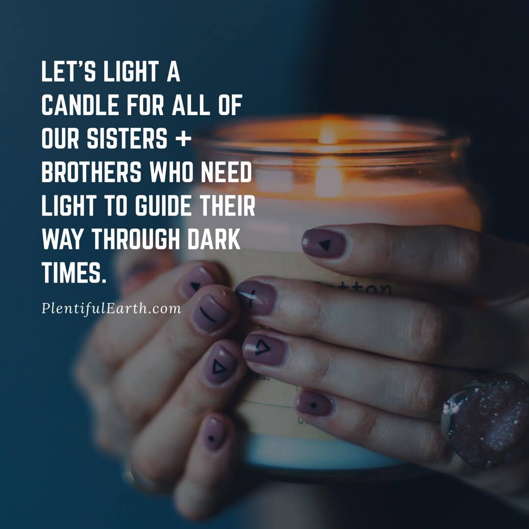 A pair of hands holding a lit candle with a spiritual message about offering light and guidance to those in need during dark times.