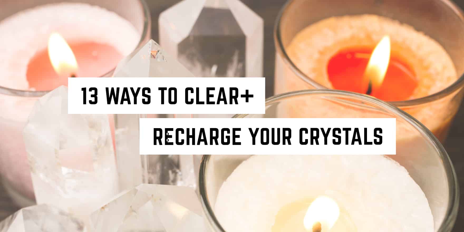A serene setting with flickering candles and clear quartz crystals in a metaphysical shop, accompanied by the text "13 ways to clear + recharge your crystals.