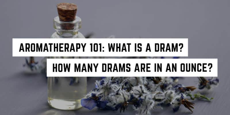 Aromatherapy 101: What is a Dram? How many drams are in an ounce? 1 A small glass bottle with a cork sits beside dried lavender flowers in a metaphysical shop, hinting at a lesson in aromatherapy and measurement conversions.