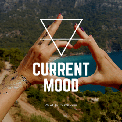 Magical Witch Quotes for Empowerment, Wisdom & Inspiration 53 Hand framing a scenic view of a tranquil bay, evoking a sense of peace and spiritual wanderlust - "current mood".