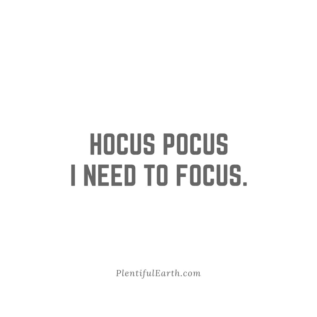 Hocus pocus, I need to focus" - a spiritual phrase aimed to invoke concentration, set on a minimalist white background.