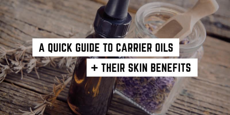 A Quick Guide to Carrier Oils and their Benefits 1 A dark amber bottle with a dropper next to a jar of dried flowers, ready to explain the wonders of carrier oils and their metaphysical advantages for skin care.