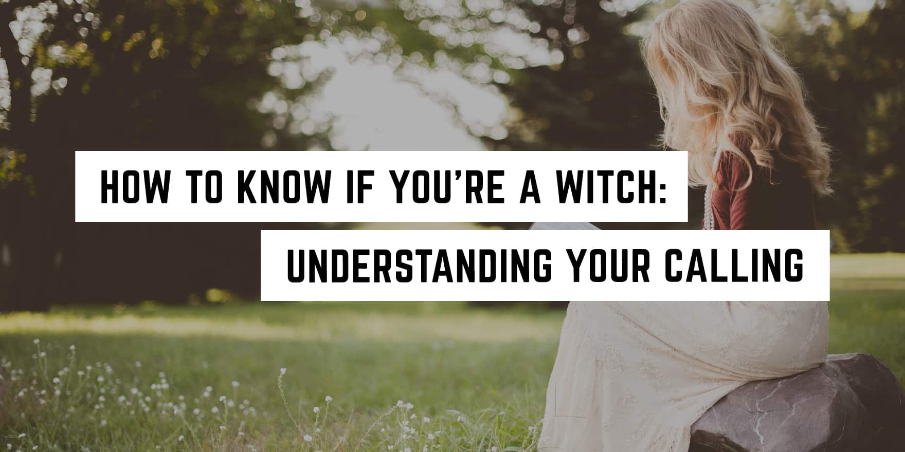 A woman sitting in a sunlit park with text overlay "how to know if you're a witch: understanding your metaphysical calling.