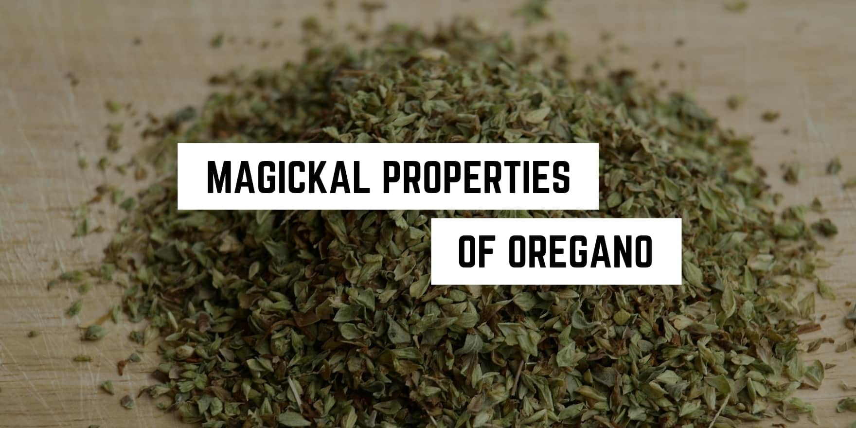 A pile of dried oregano on a wooden surface with a caption that reads "occult properties of oregano.