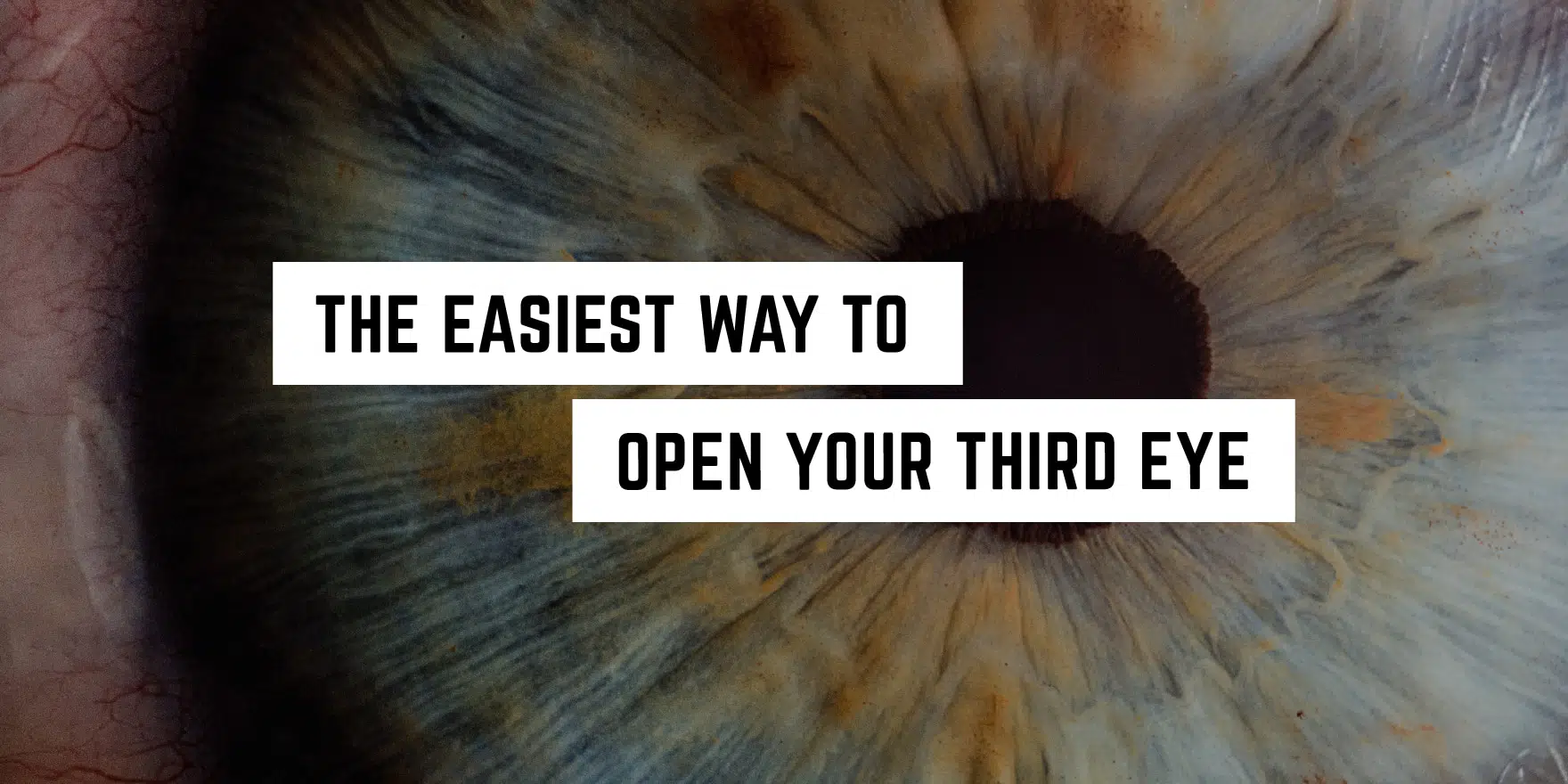 Close-up of a blue human iris with text overlay: "The easiest way to open your third eye with our new age product.