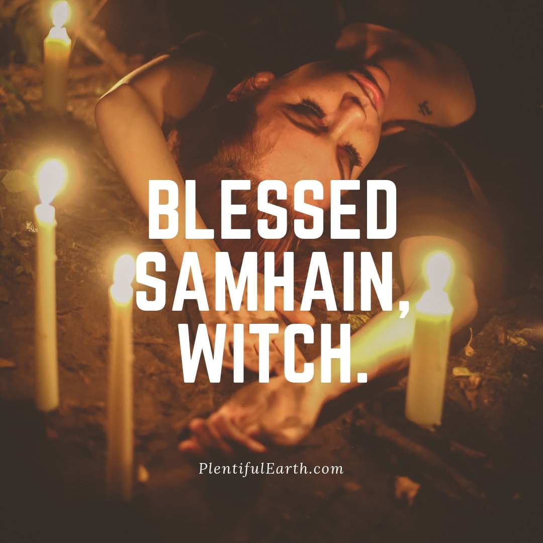 A spiritual moment captured: a person lying down surrounded by the warm glow of candles, with the greeting "blessed samhain, witch." inscribed across the image - invoking the spirit of