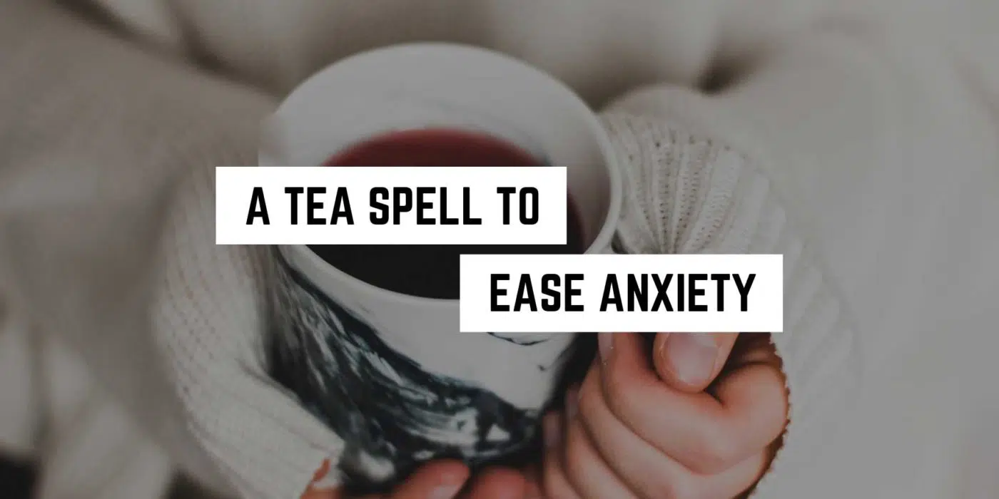 A Tea Spell to Ease Anxiety 1 Cozy hands cradling a steaming cup of tea, an inviting moment for relaxation and calm infused with metaphysical energy.