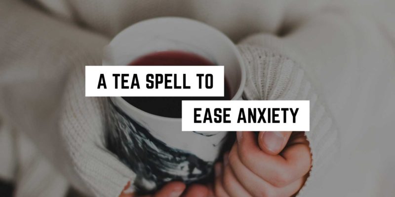 A Tea Spell to Ease Anxiety 6 Cozy hands cradling a steaming cup of tea, an inviting moment for relaxation and calm infused with metaphysical energy.