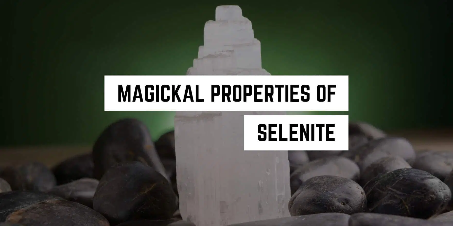 A selenite crystal tower stands amidst smooth pebbles, evoking a sense of tranquility and the mystical allure of new age product healing.
