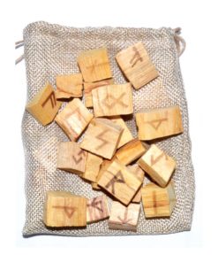 brown wooden runes on a brown bag