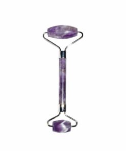 A purple crystal face roller massage tool