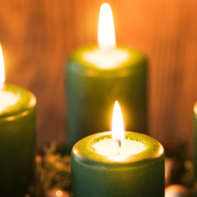 4 Candles Money Spell 37 Four lit, green spell candles in a square