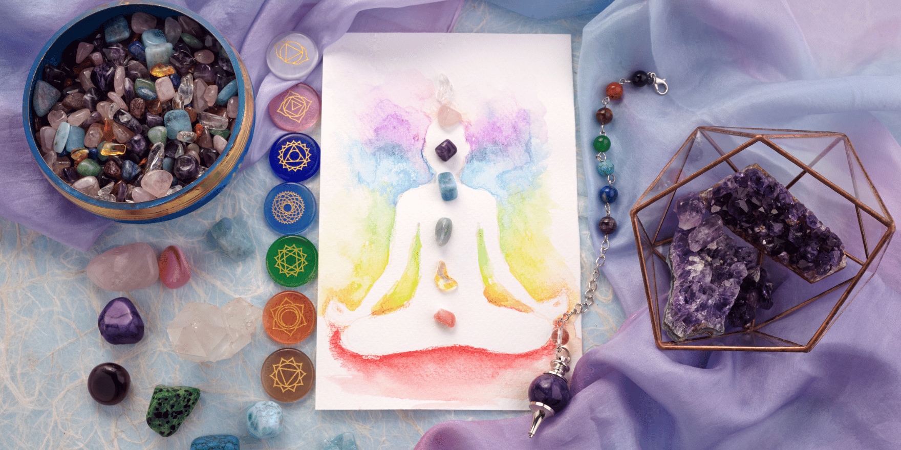 A chakra diagram with chakra stones and crystals