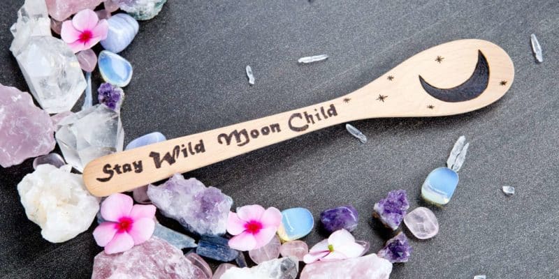 13 Things To Do During A Full Moon To Align Your Natural Energies 6 A magical spoon resting on a crescent line of crystals