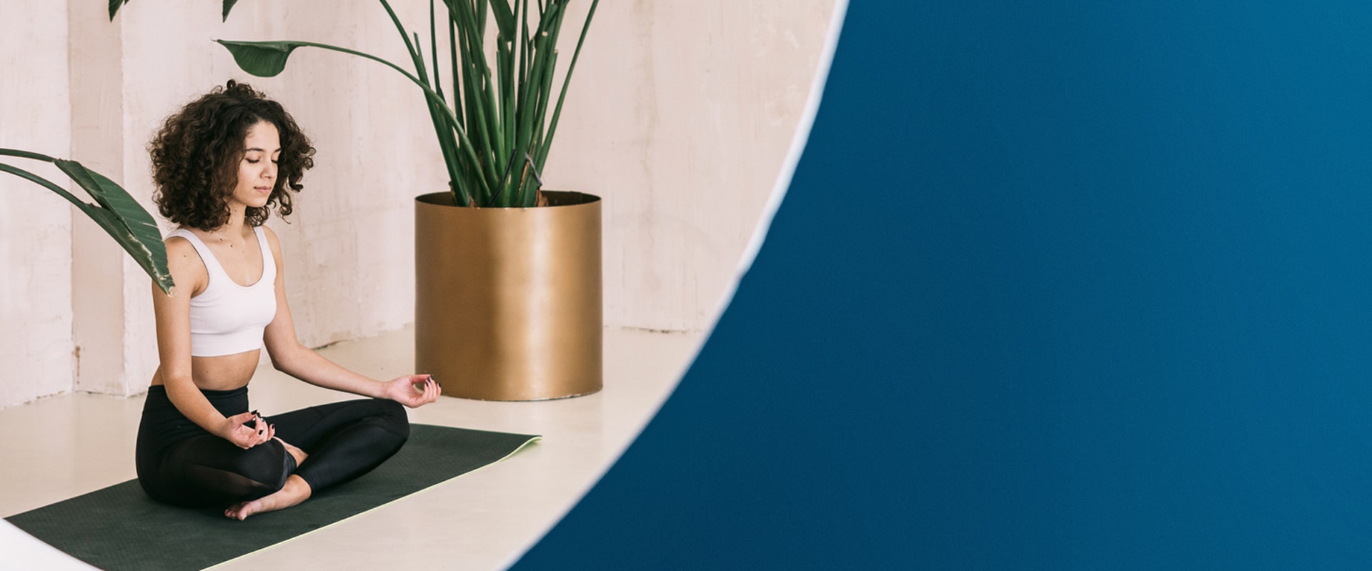 A woman meditating in a blue circle