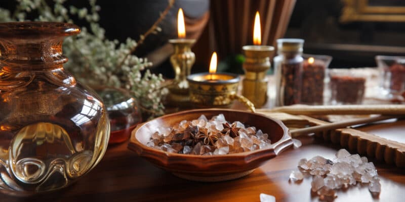 Magical Properties of Benzoin | How to Use Benzoin in Spells 3 An altar covered with candles and benzoin incense