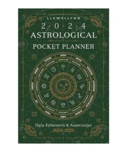 A green book with an astrological chart on the cover