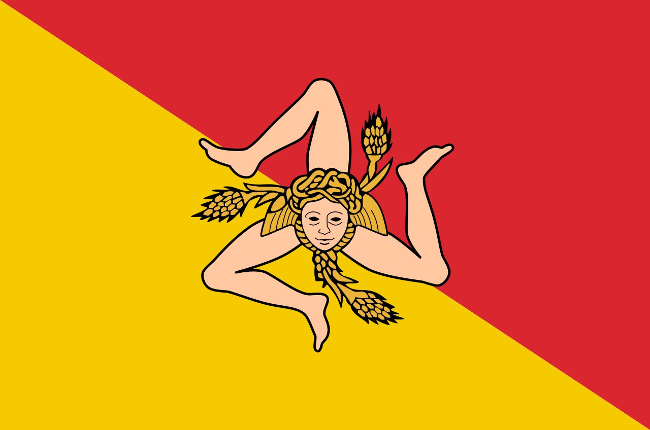 Flag of Sicily Plentiful Earth | Global Spirituality The flag of Sicily: a red and yellow diagonal field with the Trinacria, three bent legs around the head of Medusa